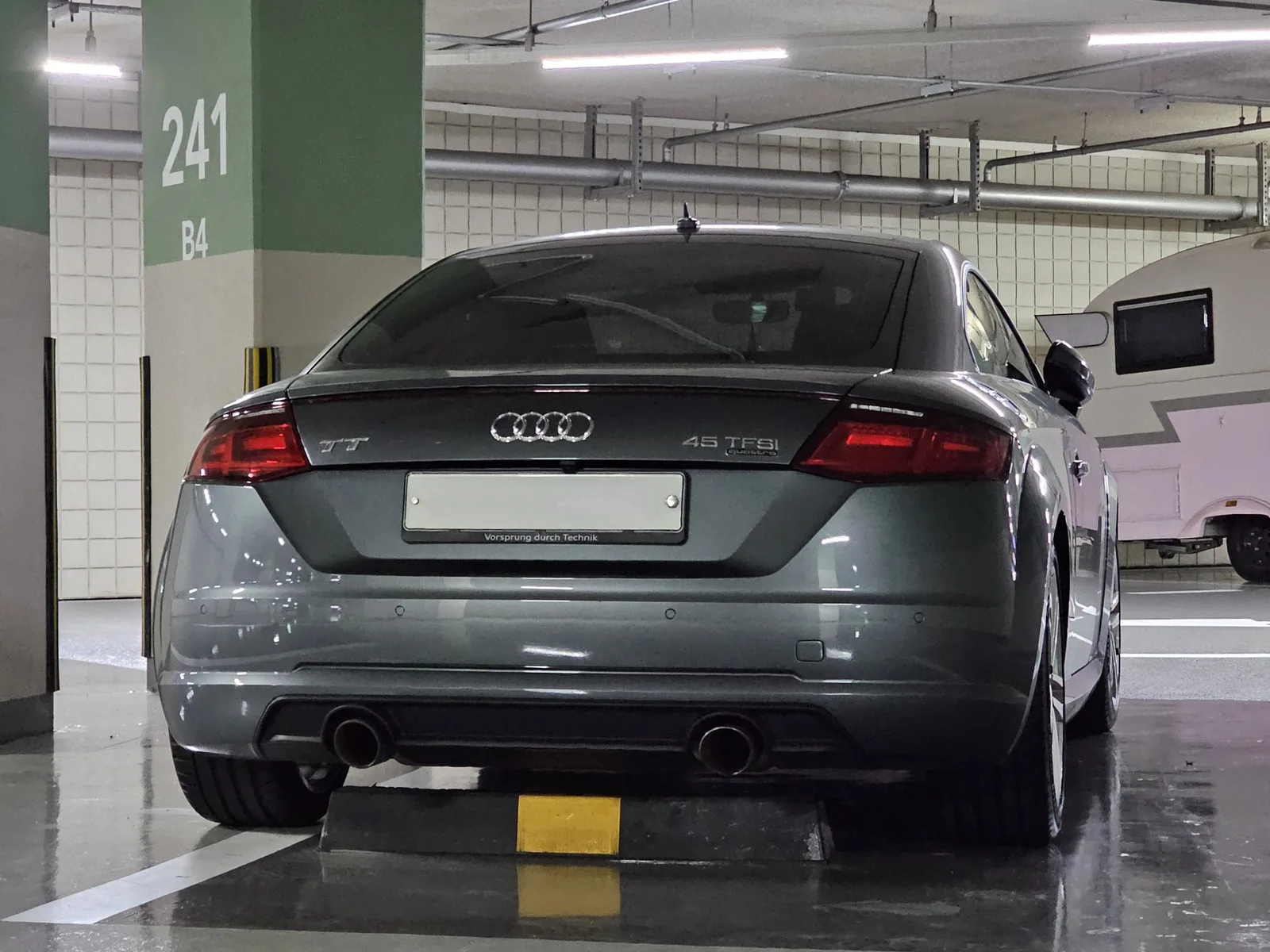 Audi TT occasion 2026 vue arrière trois quarts coupé sportif jantes alliage
