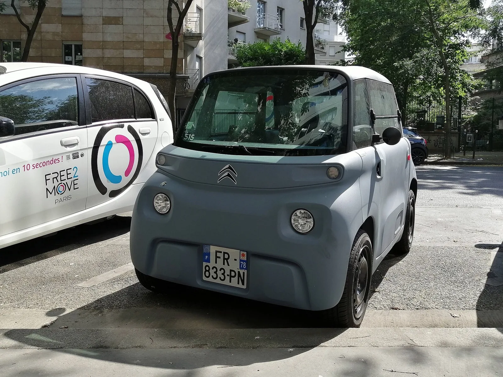 Citroën Ami quadricycle électrique garée en ville, prix et autonomie 2026