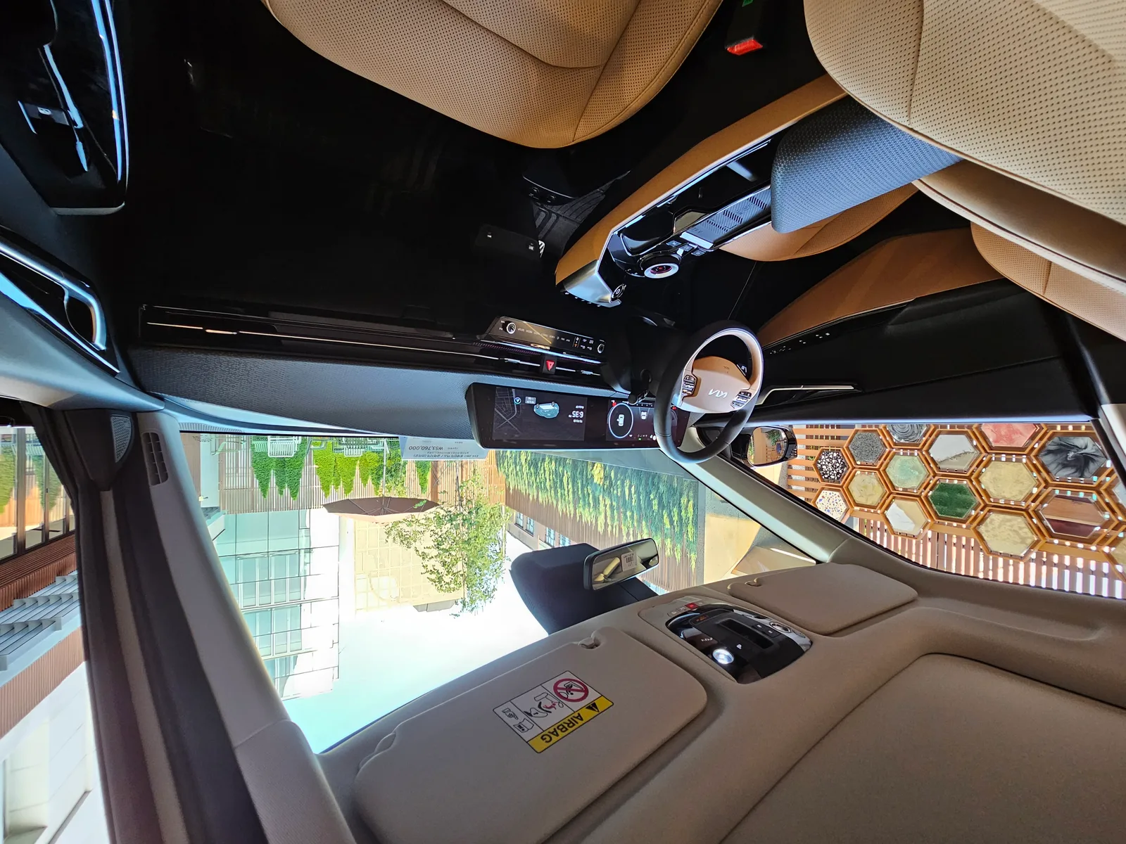 Kia EV6 2026 intérieur tableau de bord cockpit écrans doubles 12,3 pouces SUV électrique design premium